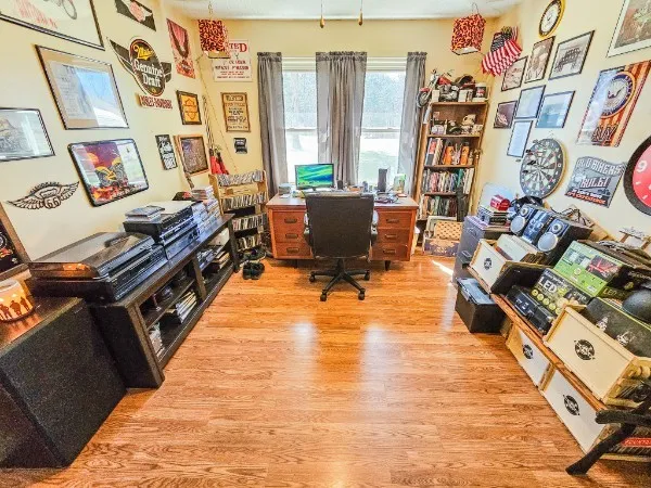 a room with furniture and book shelf