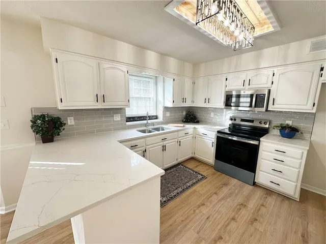 $450,000 | 4600 Northeast Kingston Drive, Lee's Summit, MO 64064