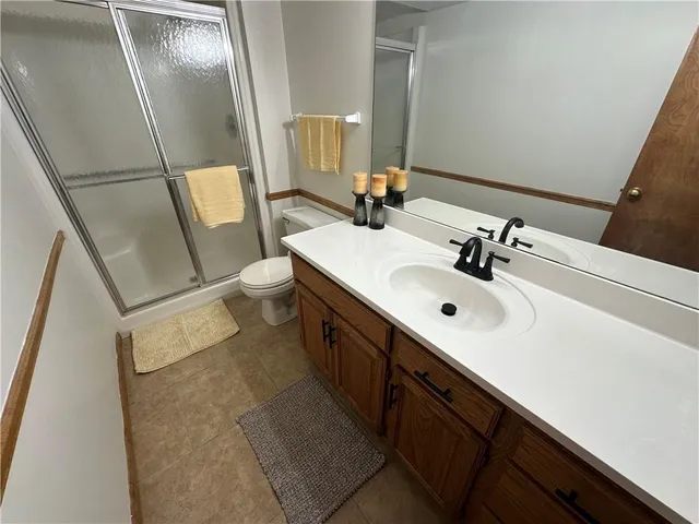 $450,000 | 4600 Northeast Kingston Drive, Lee's Summit, MO 64064