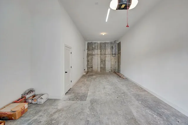 a view of empty room with ceiling fan