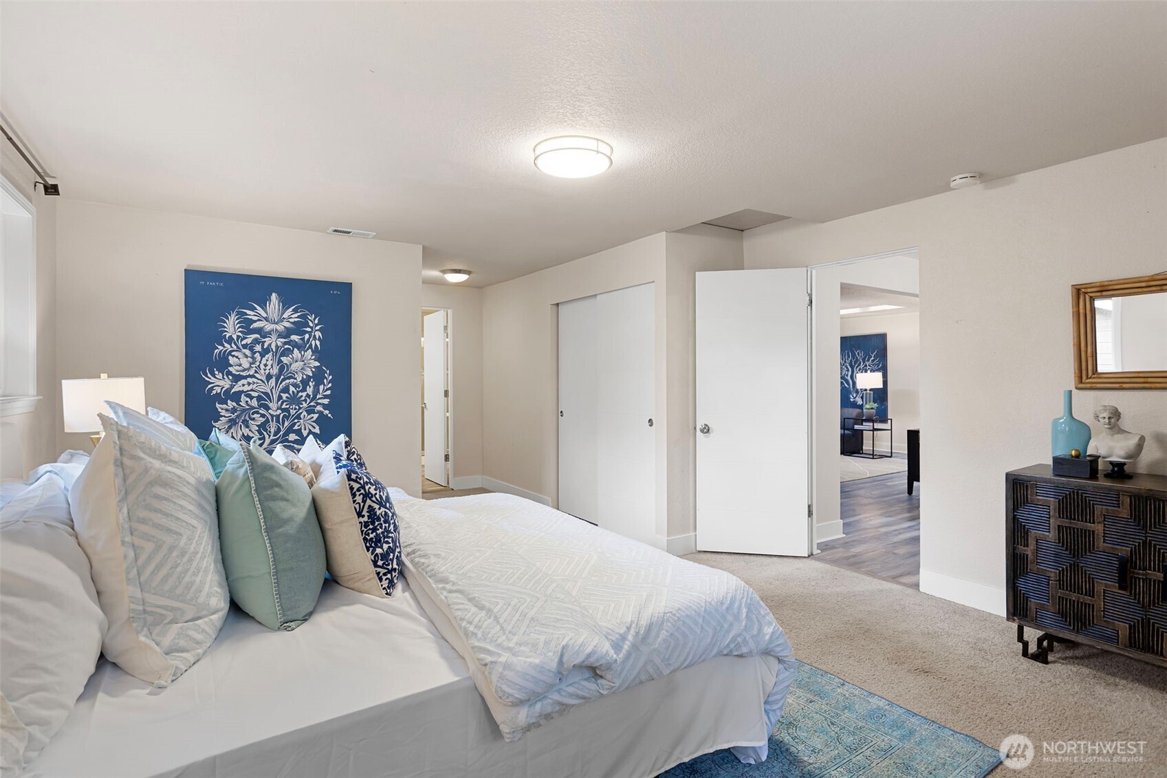 11705 Silver Way Everett, WA 98208 - Photo 13 of 26 a bedroom with a large bed and a couch