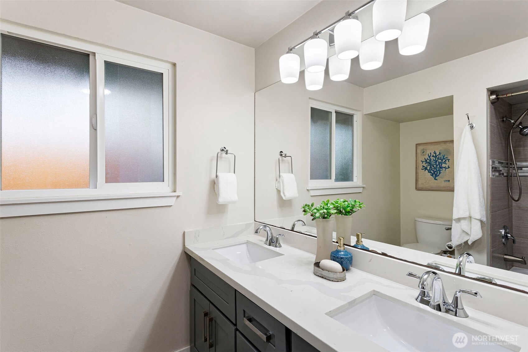 11705 Silver Way Everett, WA 98208 - Photo 20 of 26 a bathroom with a sink and a mirror