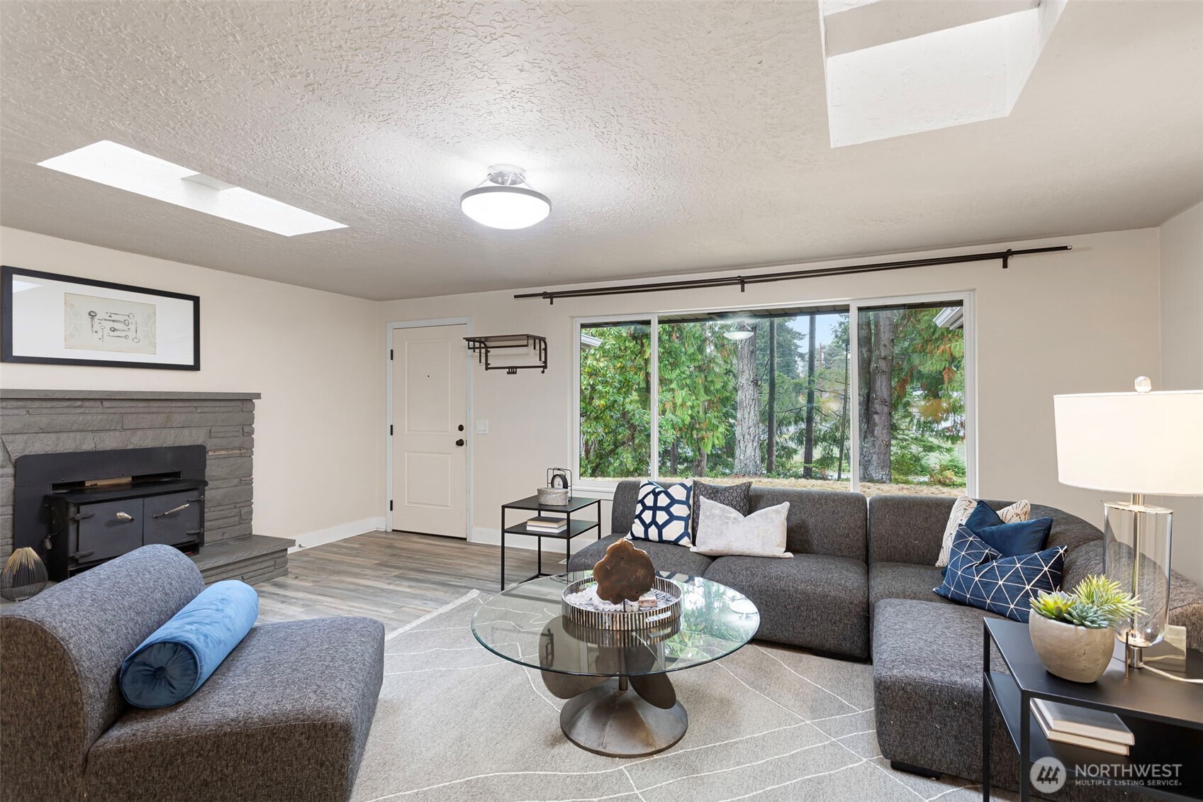11705 Silver Way Everett, WA 98208 - Photo 4 of 26 a living room with furniture and a fireplace