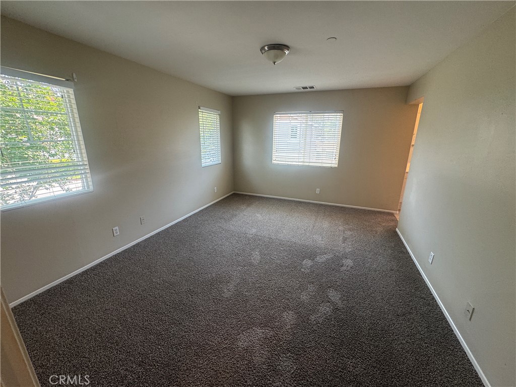 9757 Edenbrook Drive Riverside, CA 92503 - Photo 26 of 40 a view of an empty room with a window