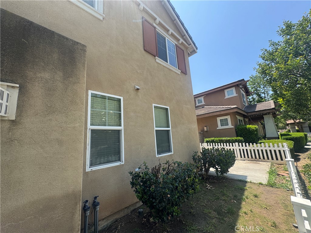 9757 Edenbrook Drive Riverside, CA 92503 - Photo 35 of 40 a view of a house with a yard