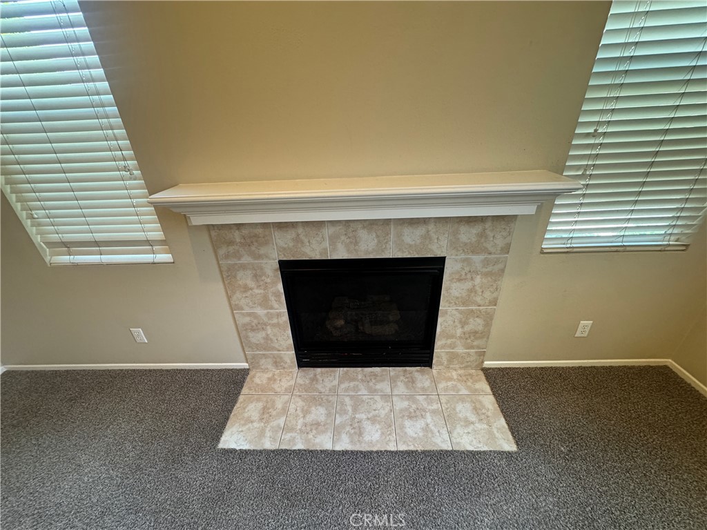 9757 Edenbrook Drive Riverside, CA 92503 - Photo 7 of 40 a living room with a fireplace