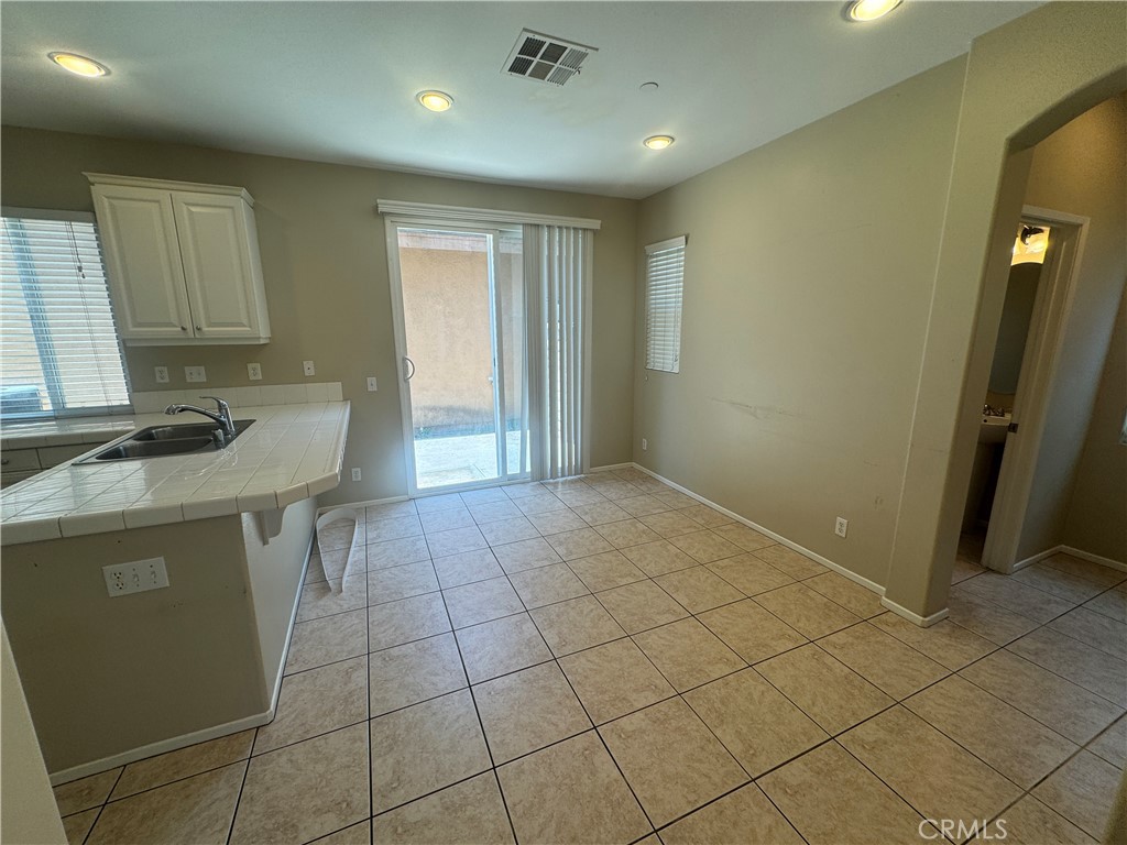 9757 Edenbrook Drive Riverside, CA 92503 - Photo 8 of 40 a view of a kitchen with a sink