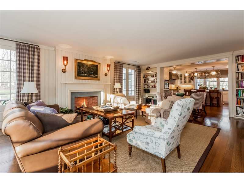 15 Shagbark Road Darien, CT 06820 - Photo 11 of 25 a living room with furniture and a fireplace