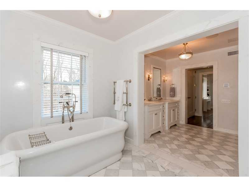 15 Shagbark Road Darien, CT 06820 - Photo 15 of 25 a spacious bathroom with a bathtub sink and mirror