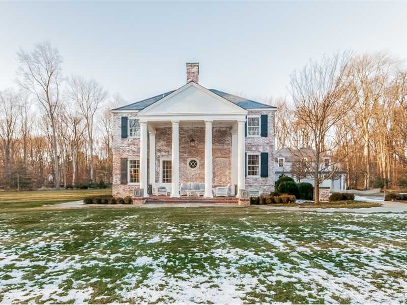 15 Shagbark Road Darien, CT 06820 - Photo 3 of 25 a front view of a house with a yard