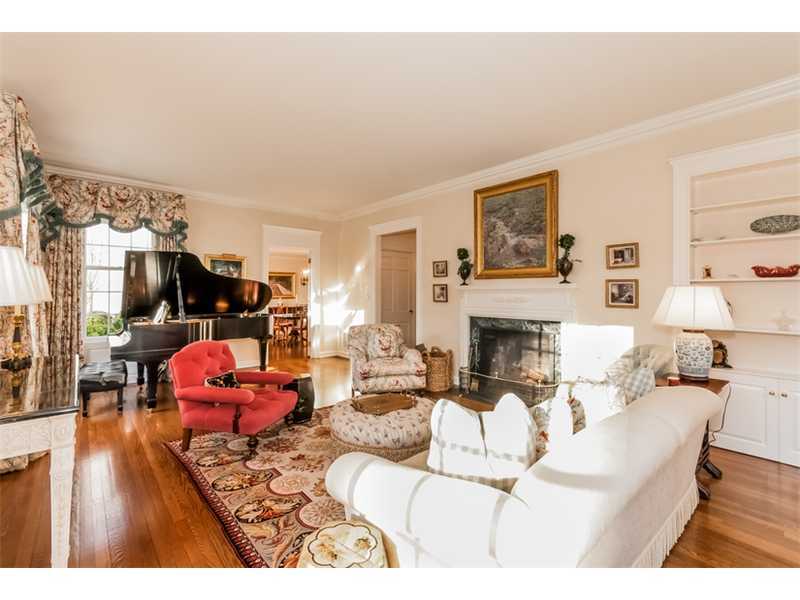 15 Shagbark Road Darien, CT 06820 - Photo 5 of 25 a living room with furniture and a fireplace