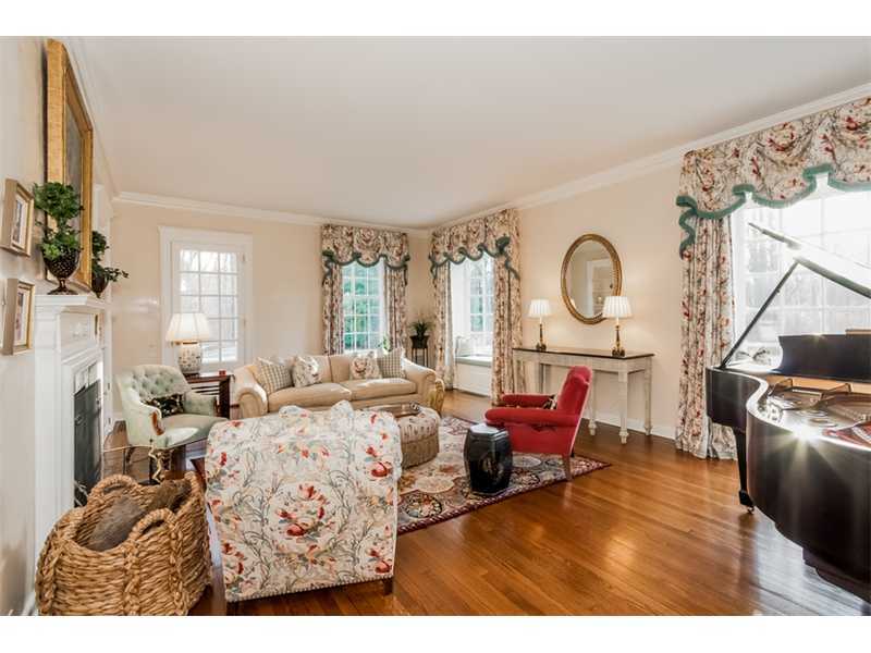 15 Shagbark Road Darien, CT 06820 - Photo 6 of 25 a living room with furniture a fireplace and decor