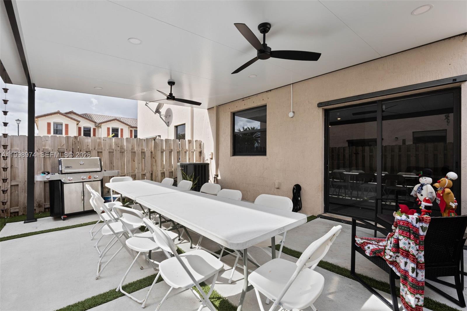 15070 Southwest 119TH Lane Miami, FL 33196 - Photo 13 of 30 a view of a dining room with furniture