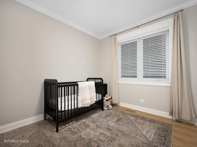 a view of a room with a window and a window