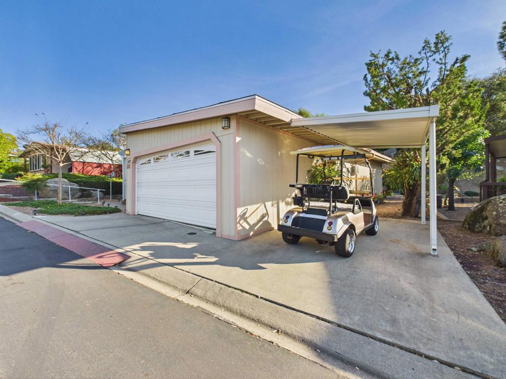 18218 Paradise Mountain Road, Unit 220 Valley Center, CA 92082 - Photo 46 of 48 a view of a house with a patio