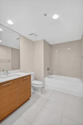 a view of a city with tall buildings