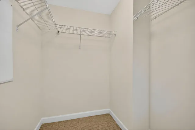 a view of a chairs and table in a patio