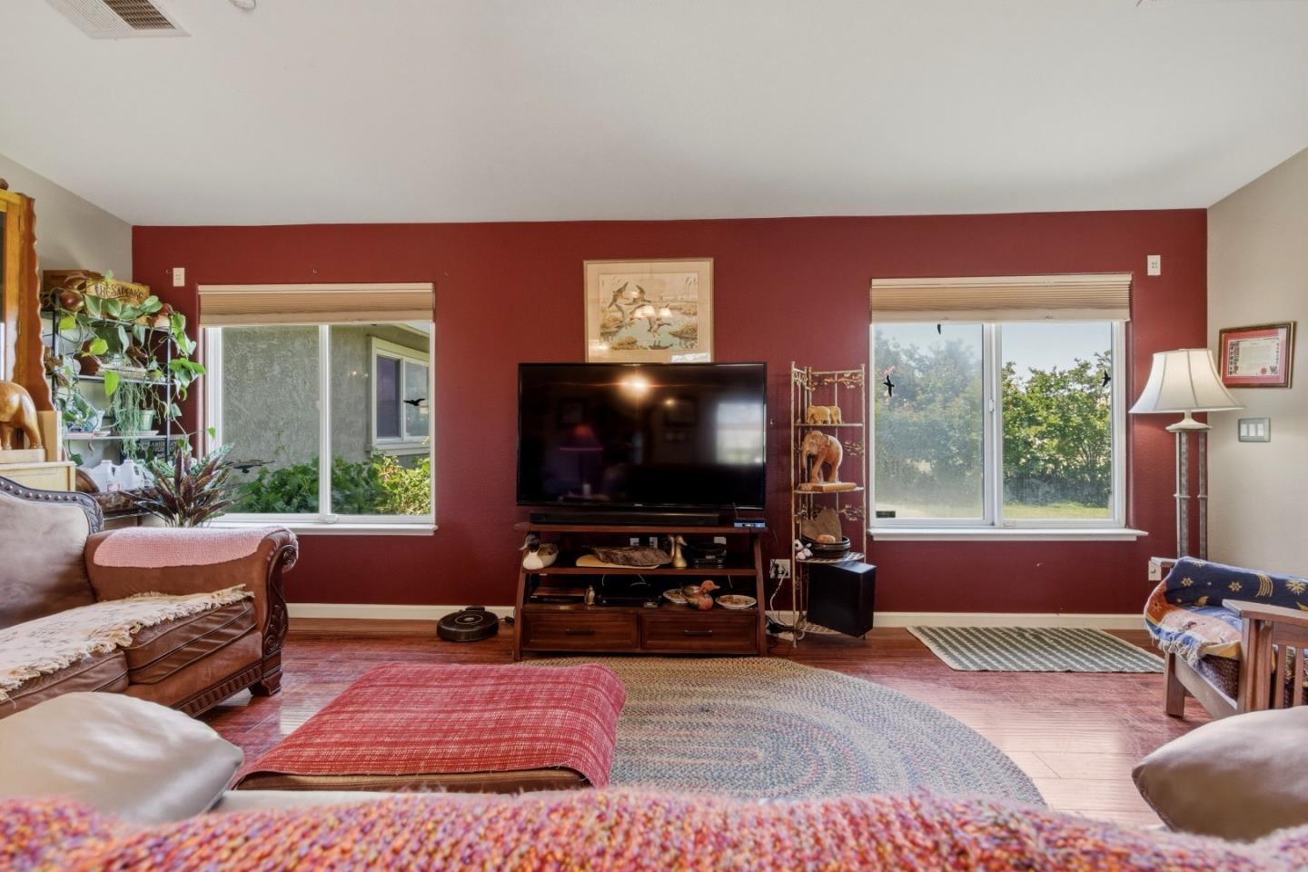 38780 Dinosaur Point Road Hollister, CA 95023 - Photo 4 of 34 a living room with furniture and a flat screen tv