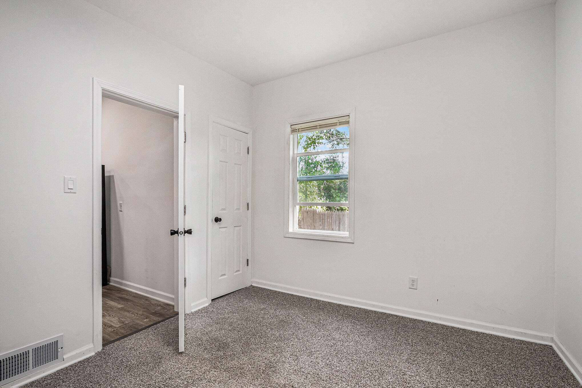 1067 Polk Street Gary, IN 46402 - Photo 9 of 13 an empty room with window