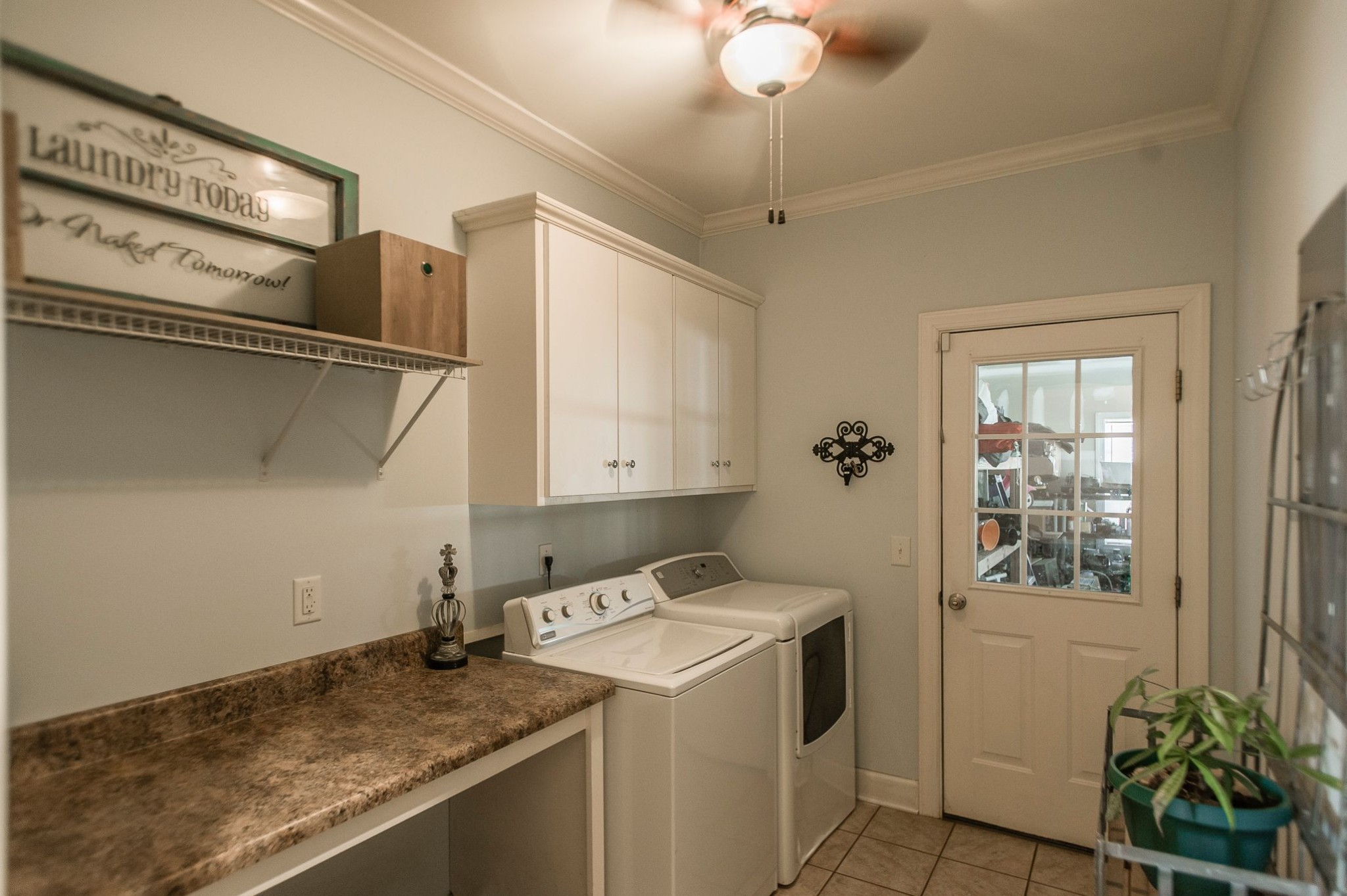 1351 Pee Dee Branch Road Cottontown, TN 37048 - Photo 29 of 59 a utility room with closet dryer and washer