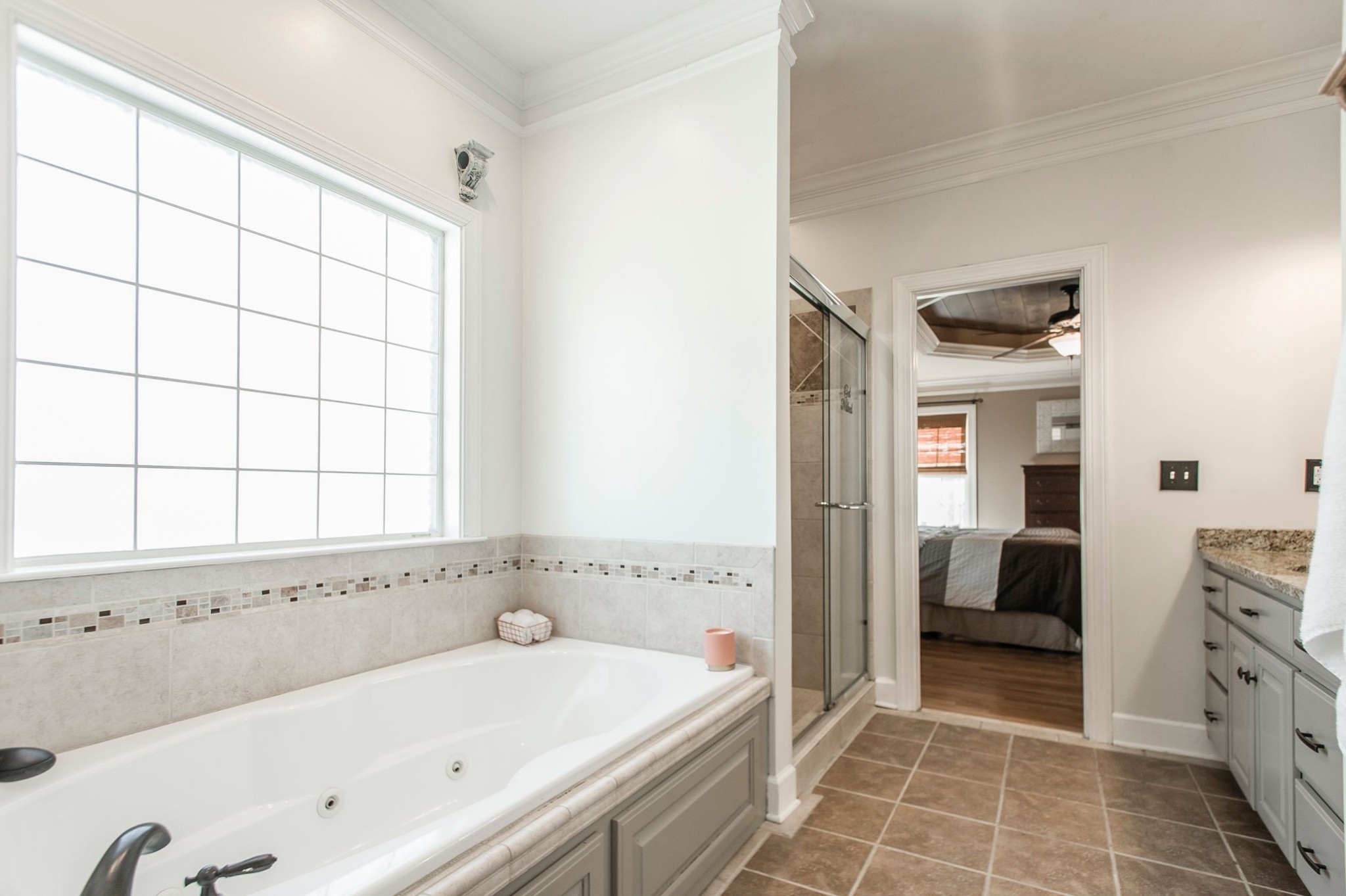 1351 Pee Dee Branch Road Cottontown, TN 37048 - Photo 32 of 59 a bathroom with a bathtub and a shower