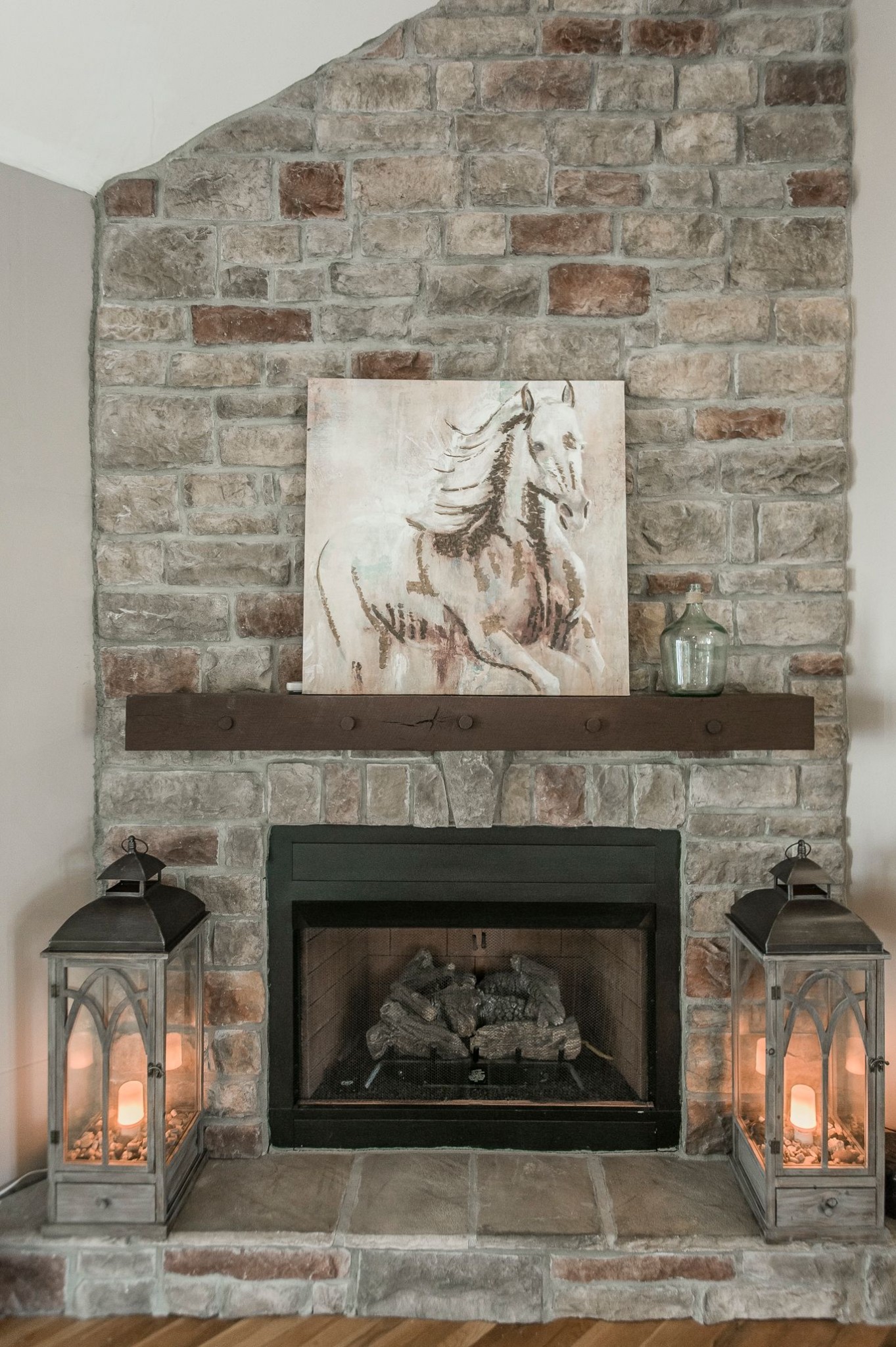 1351 Pee Dee Branch Road Cottontown, TN 37048 - Photo 5 of 59 a fireplace with a clock on top of it