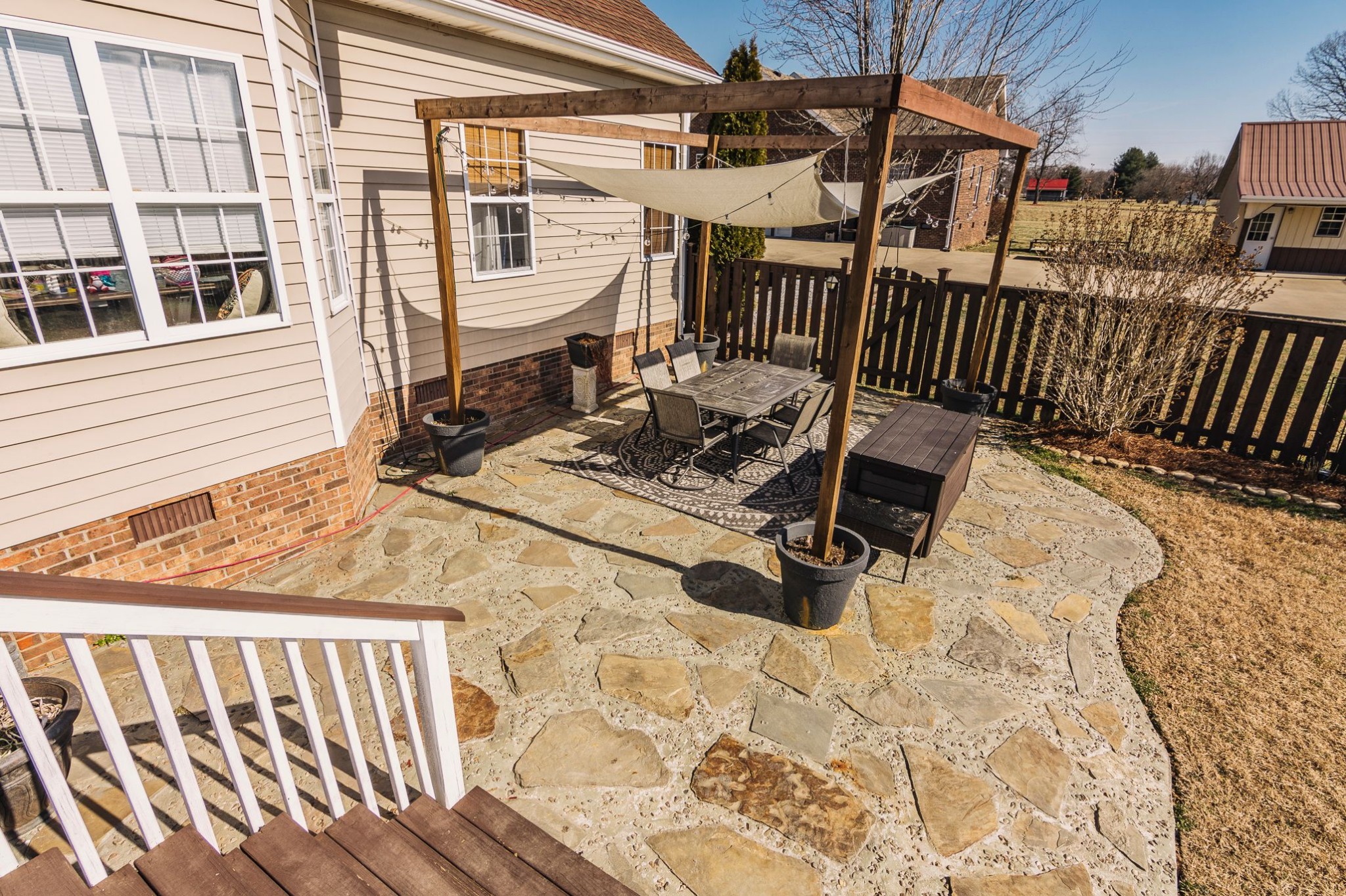 1351 Pee Dee Branch Road Cottontown, TN 37048 - Photo 10 of 59 a view of a chairs and table in the patio