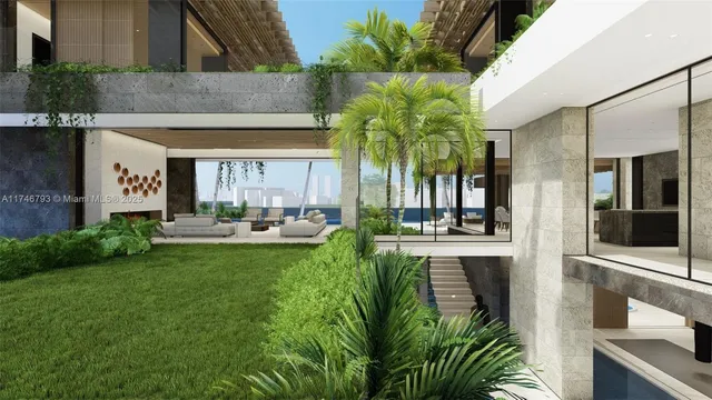 a view of a patio with couches and a table and chairs with wooden floor and fence