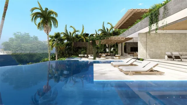 a swimming pool with outdoor seating and plants