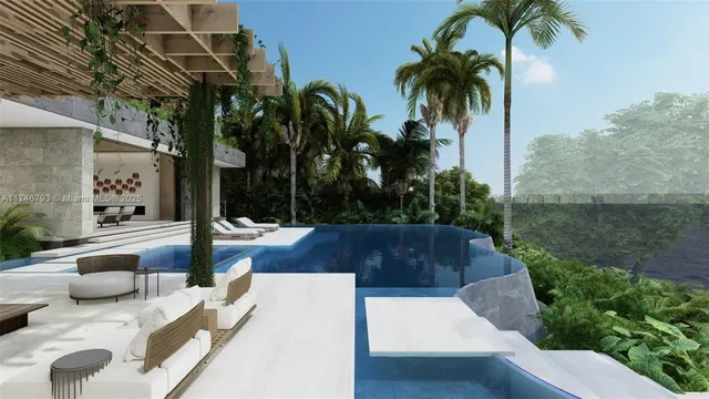 a view of a patio with a table and chairs and a potted plant