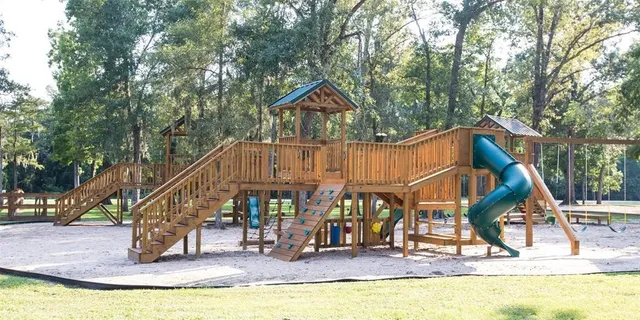 a view of a park with swings