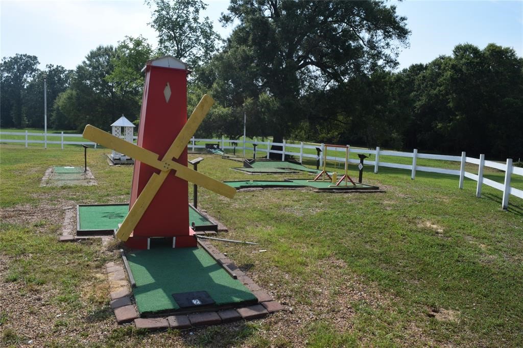 478 Center Drive Cleveland, TX 77327 - Photo 15 of 33 a view of a park with swings