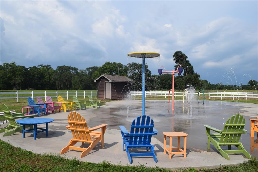 478 Center Drive Cleveland, TX 77327 - Photo 18 of 33 a swimming pool with outdoor seating