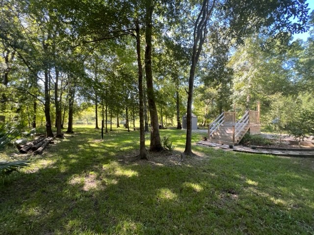 478 Center Drive Cleveland, TX 77327 - Photo 20 of 33 a view of a trees in a yard