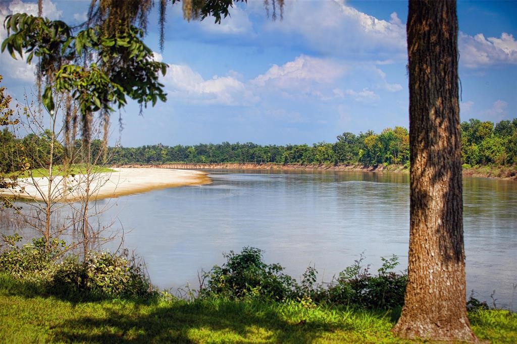 478 Center Drive Cleveland, TX 77327 - Photo 2 of 33 a view of lake with green space