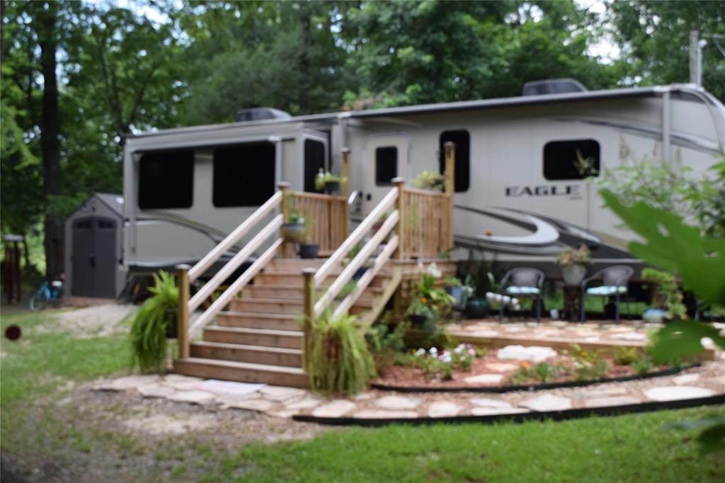 478 Center Drive Cleveland, TX 77327 - Photo 27 of 33 a front view of a house with a yard
