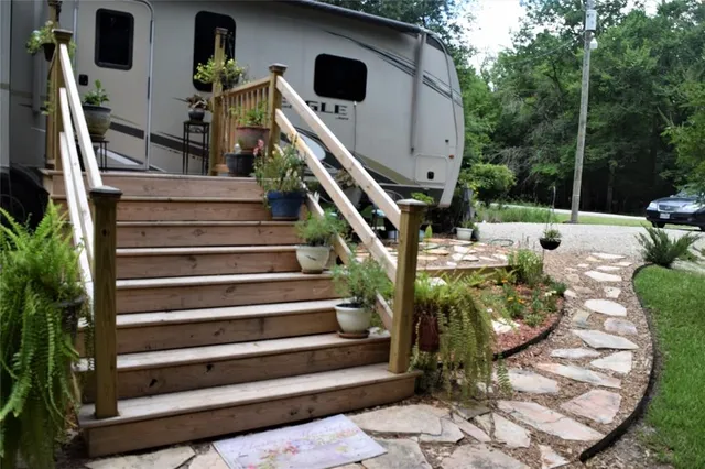 a backyard of a house with lots of green space