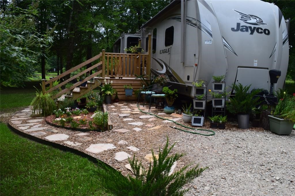 478 Center Drive Cleveland, TX 77327 - Photo 33 of 33 a view of a house with backyard and sitting area