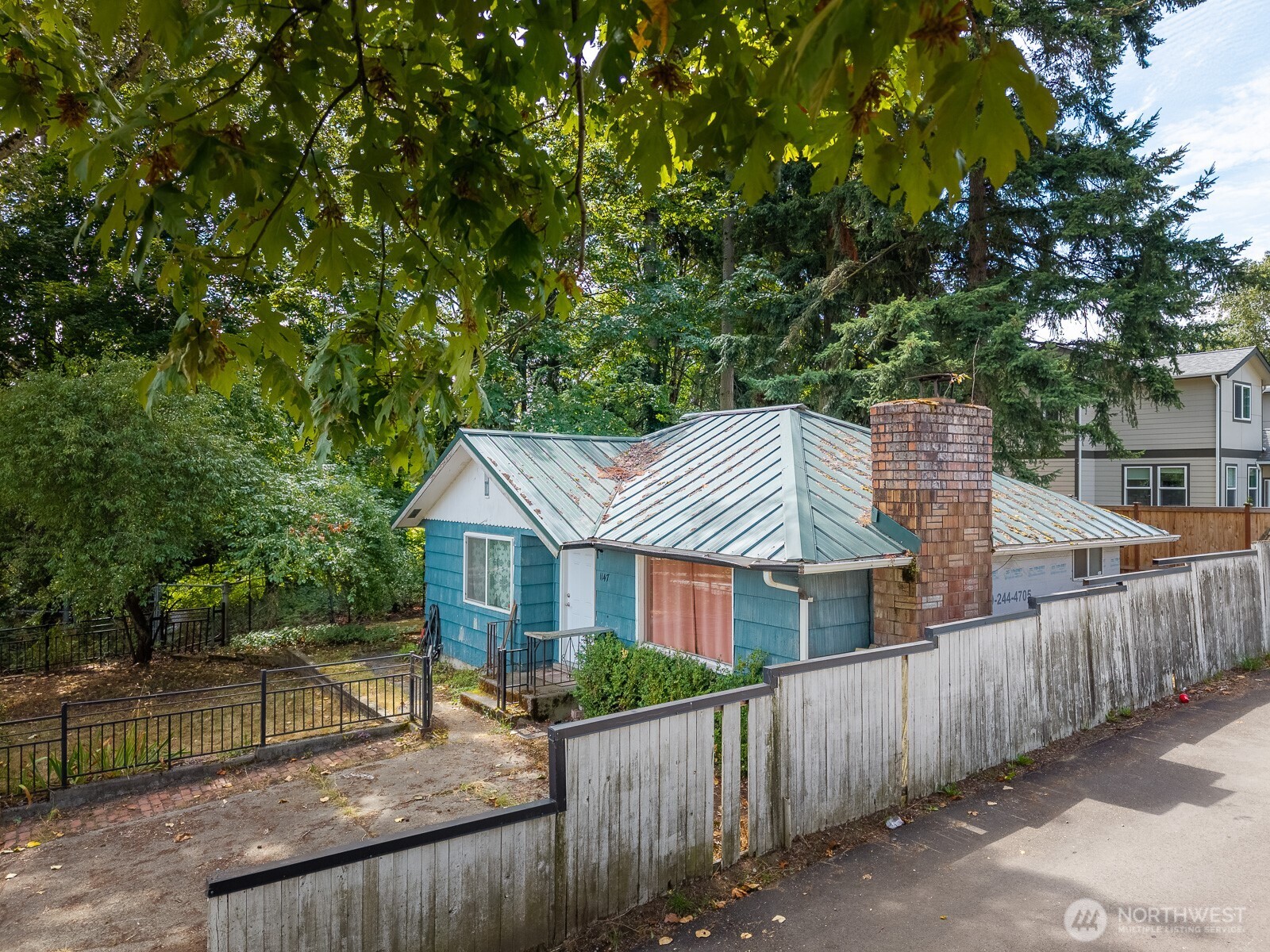 1147 Aberdeen Avenue Northeast Renton, WA 98056 - Photo 18 of 24 a view of a house with wooden fence