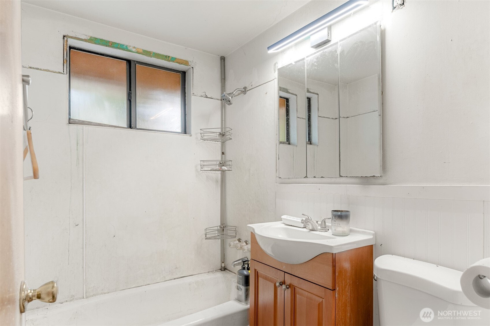 1147 Aberdeen Avenue Northeast Renton, WA 98056 - Photo 6 of 24 a bathroom with a sink a toilet and shower