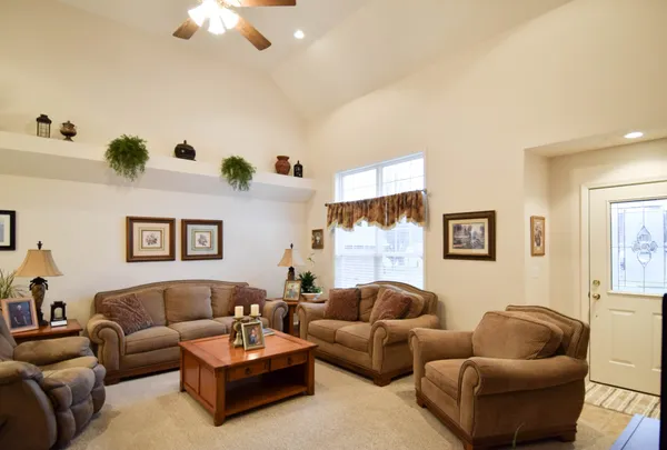 a living room with furniture and a couch