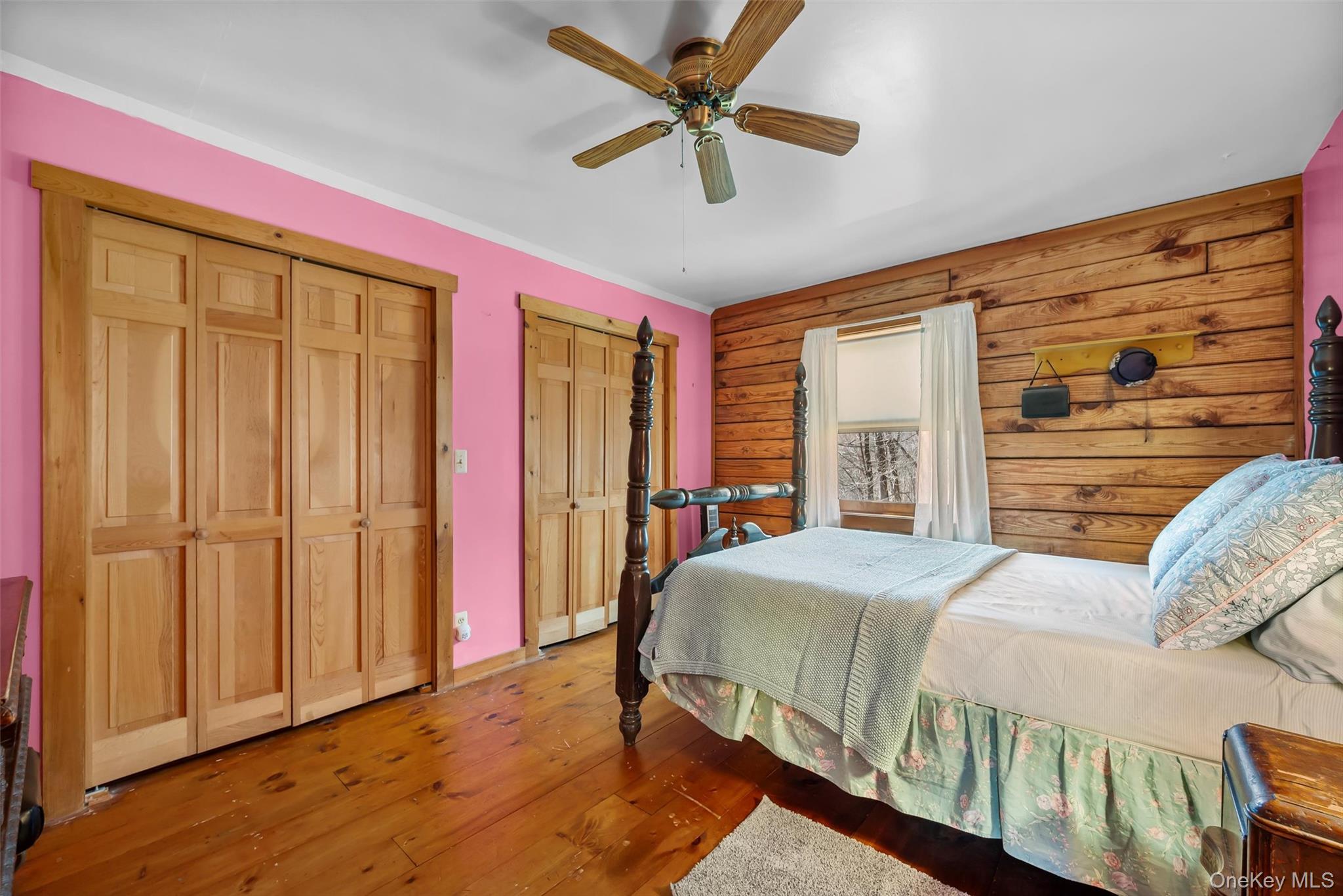 1085 County Rte 17 Montgomery, NY 12549 - Photo 19 of 50 a bedroom with a bed and a chandelier