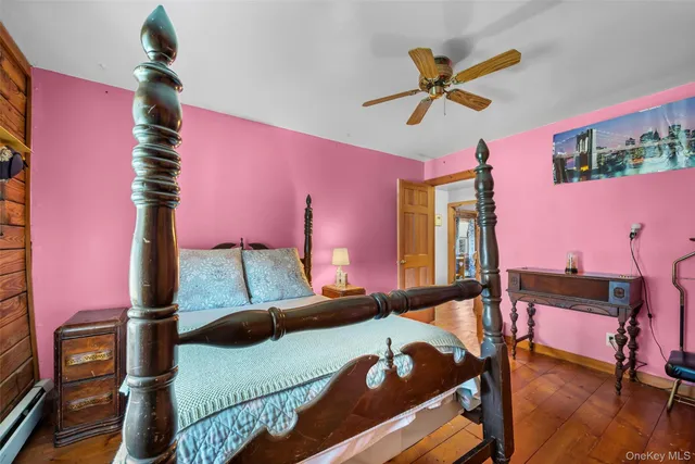 a bathroom with a sink mirror vanity and toilet