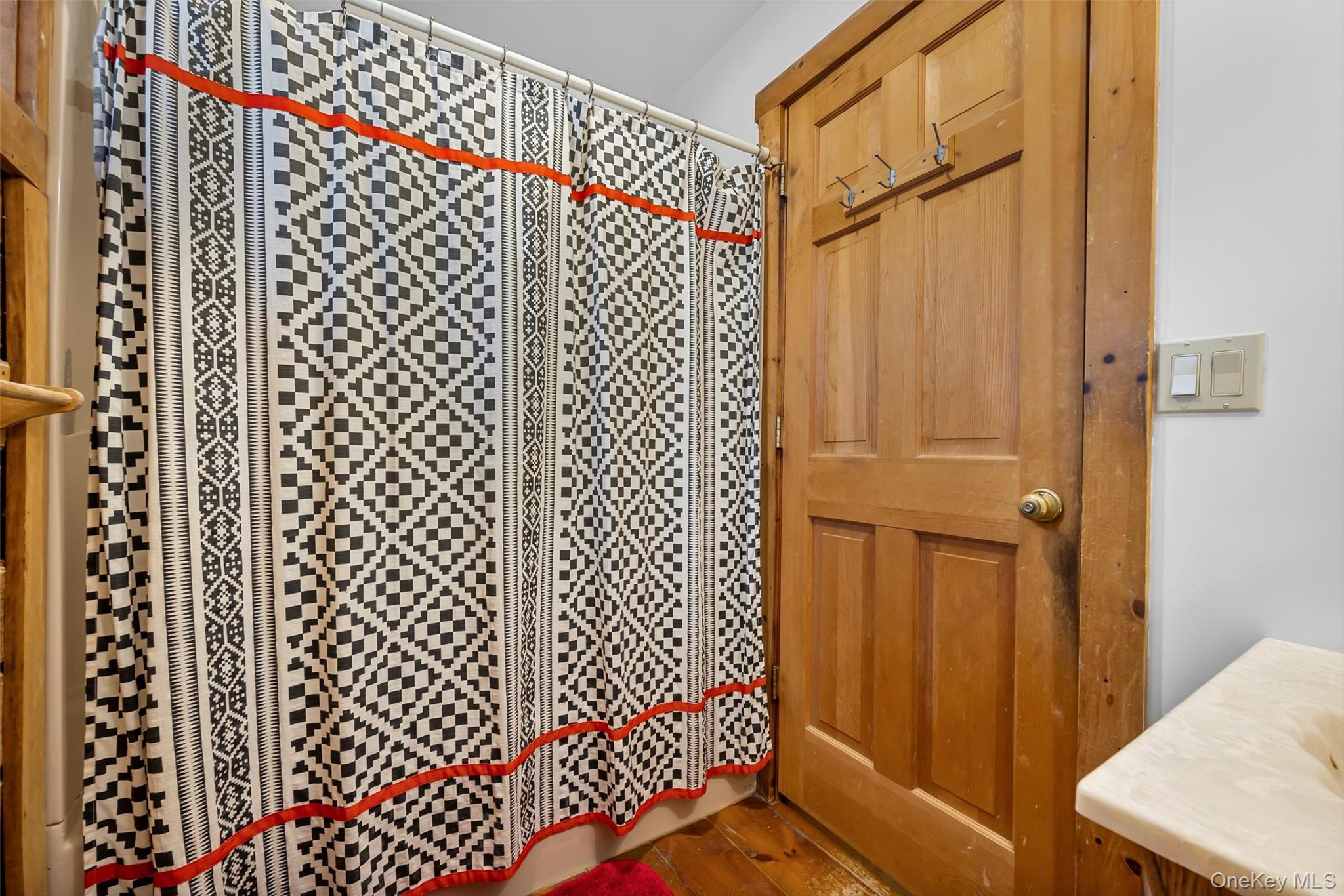 1085 County Rte 17 Montgomery, NY 12549 - Photo 24 of 50 a bathroom with a shower curtain