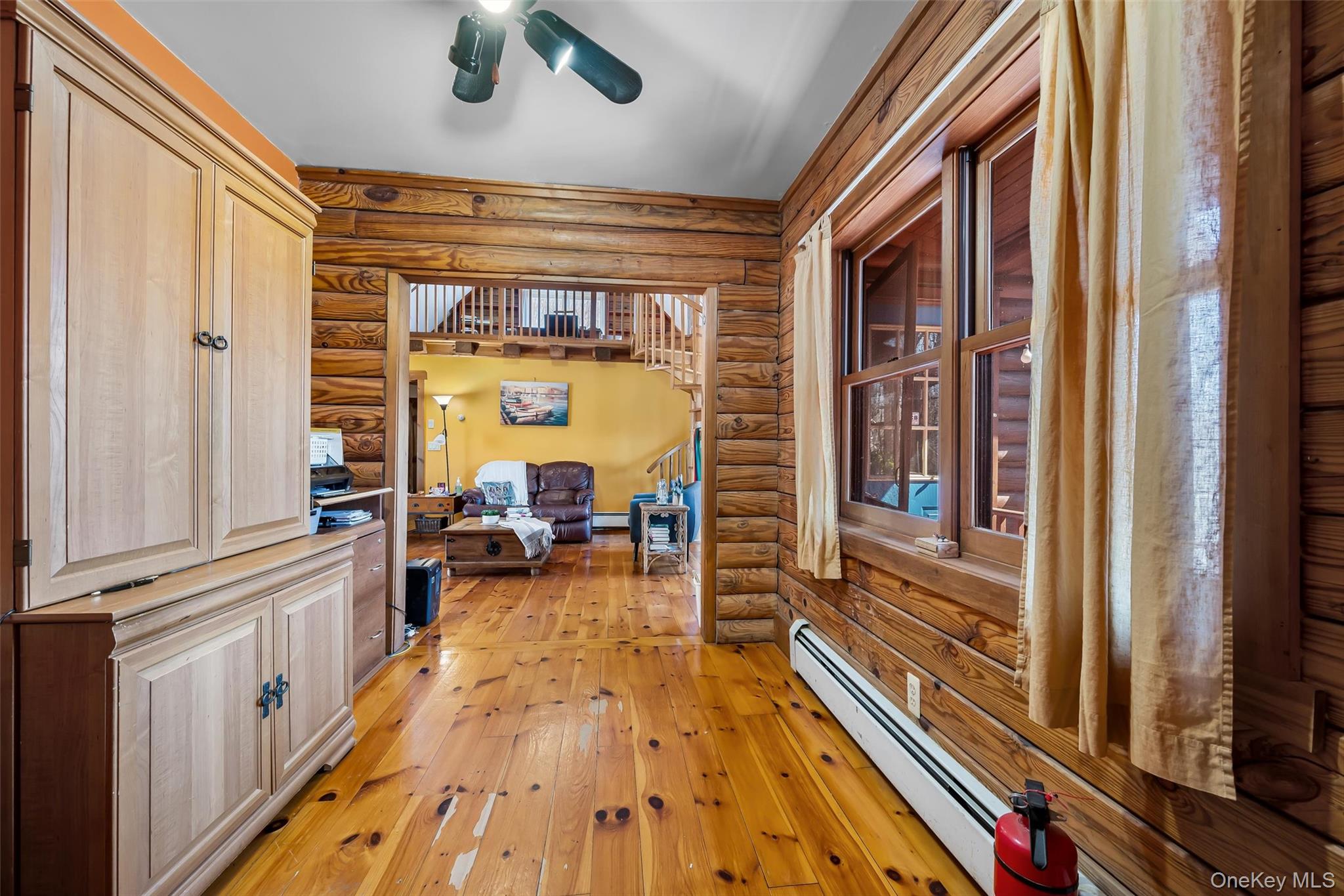 1085 County Rte 17 Montgomery, NY 12549 - Photo 30 of 50 a view of a balcony with chairs and wooden floor