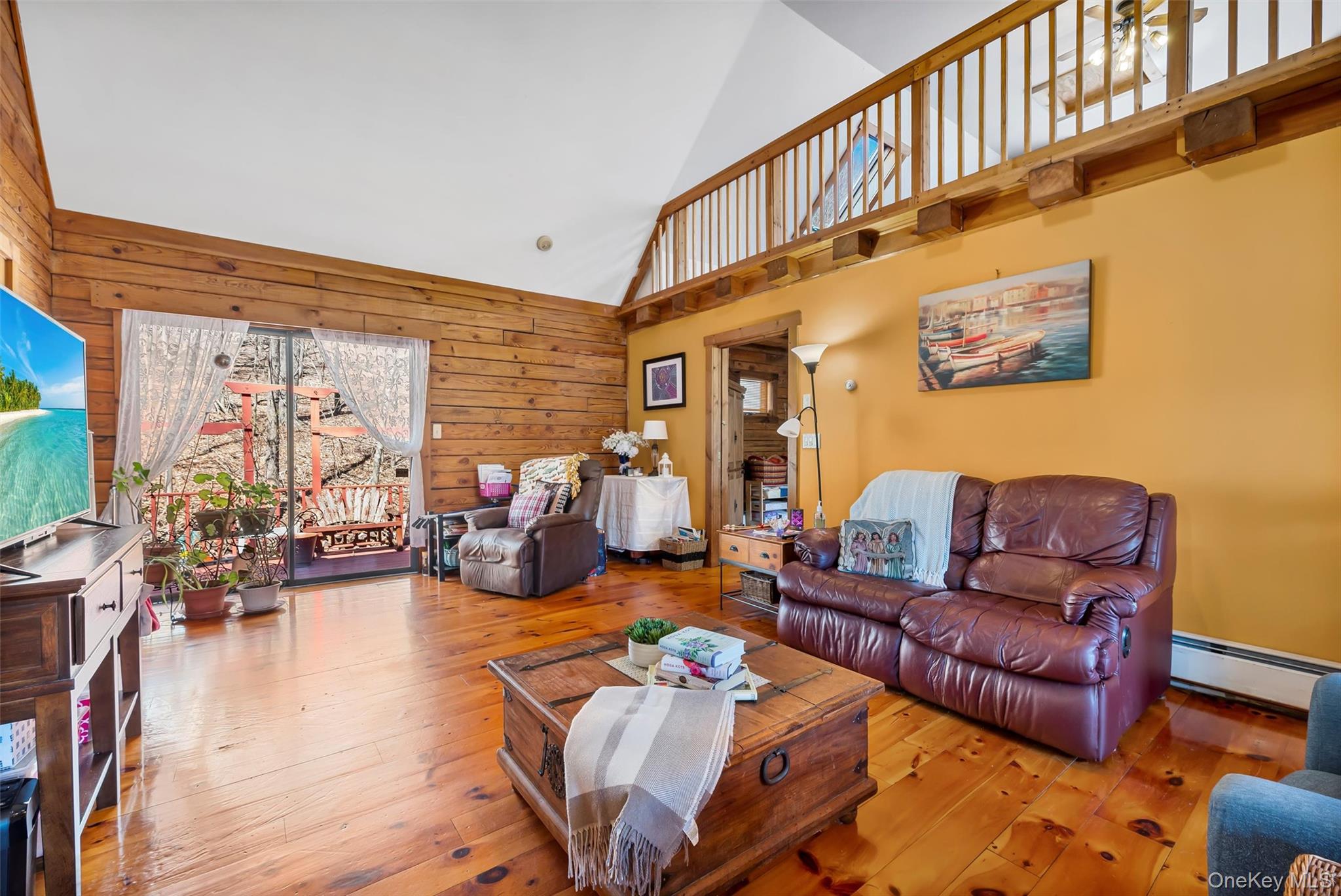 1085 County Rte 17 Montgomery, NY 12549 - Photo 31 of 50 a living room with furniture or couch and a potted plant