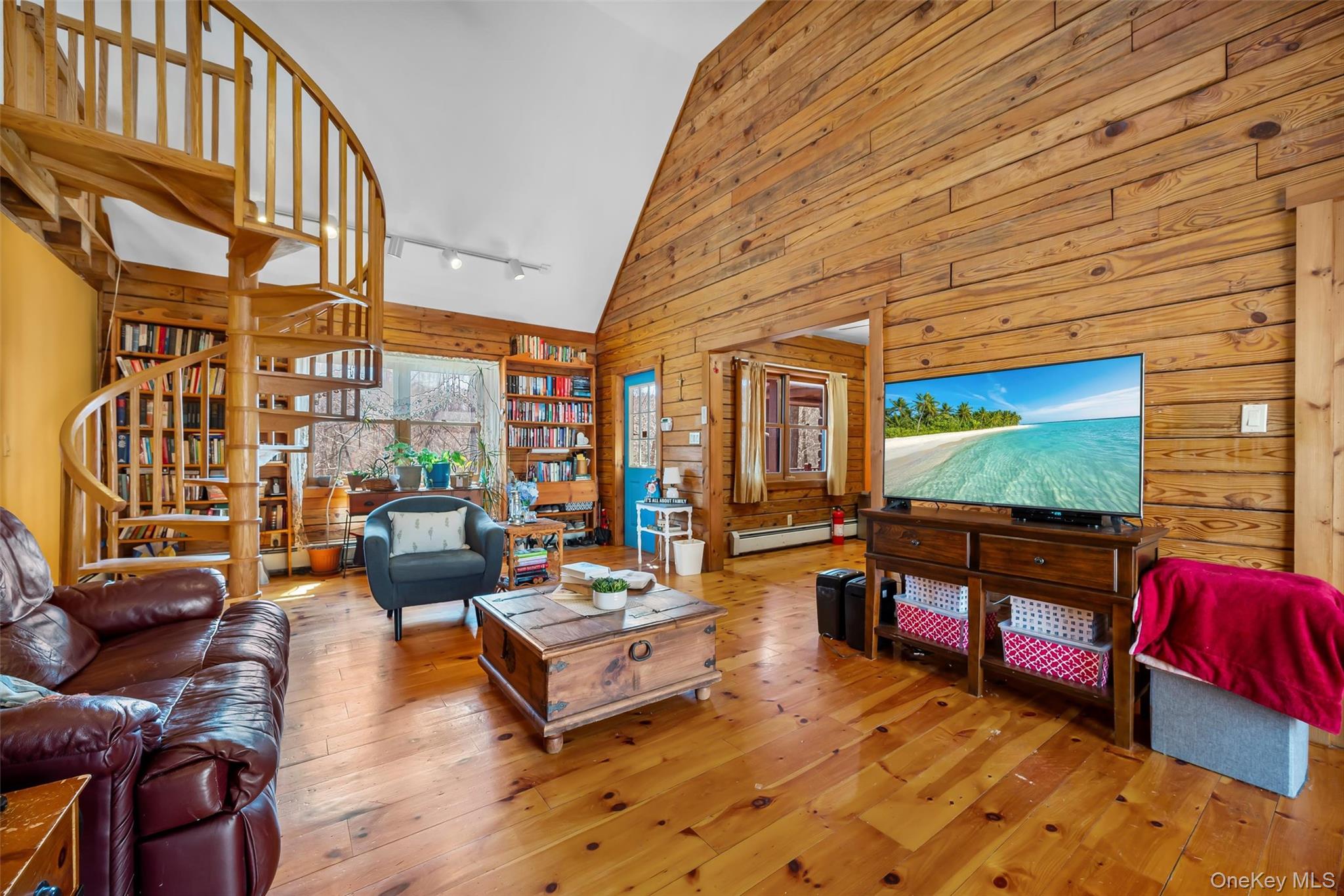 1085 County Rte 17 Montgomery, NY 12549 - Photo 33 of 50 a living room with furniture and a flat screen tv
