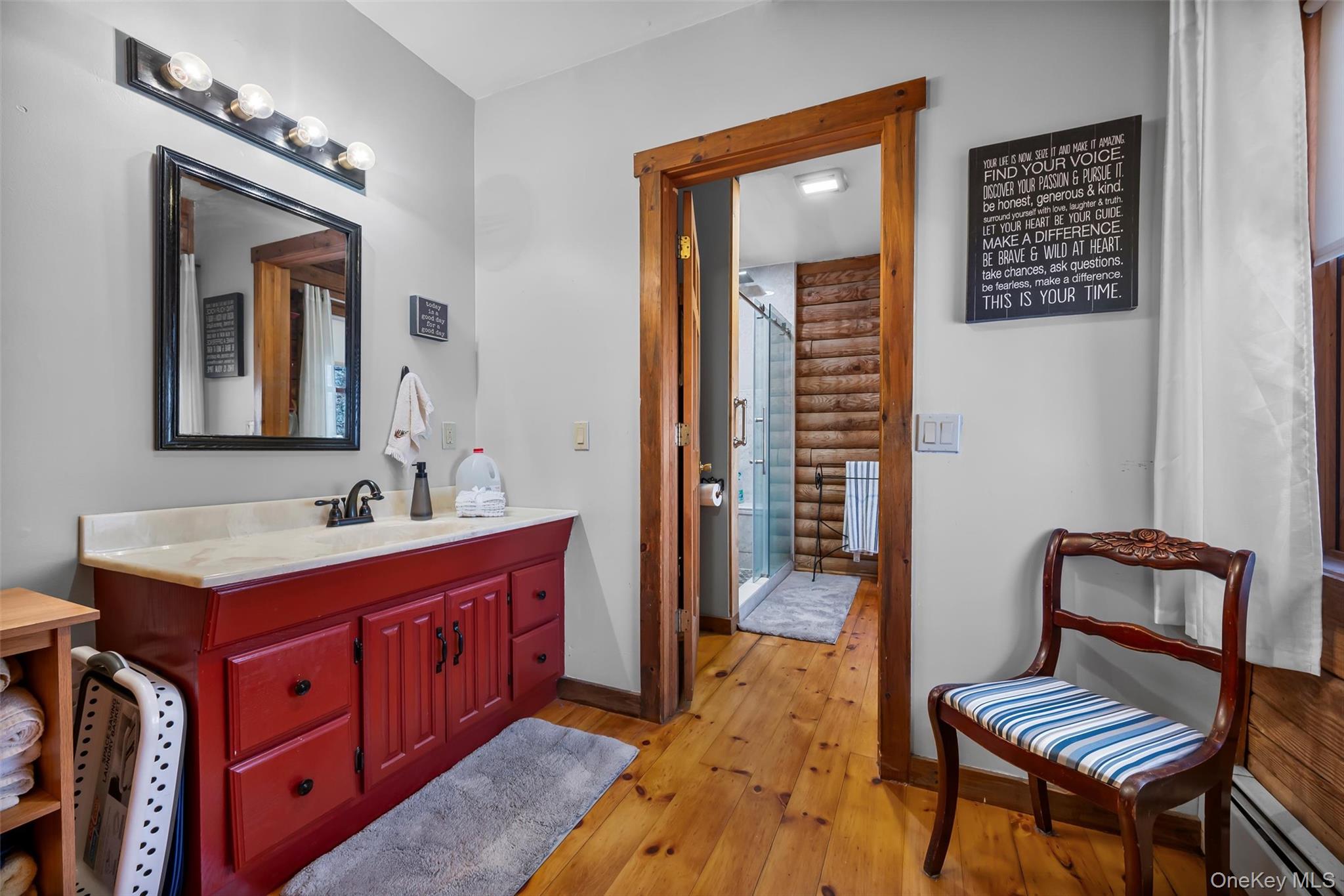 1085 County Rte 17 Montgomery, NY 12549 - Photo 39 of 50 a spacious bathroom with a double vanity sink and a mirror