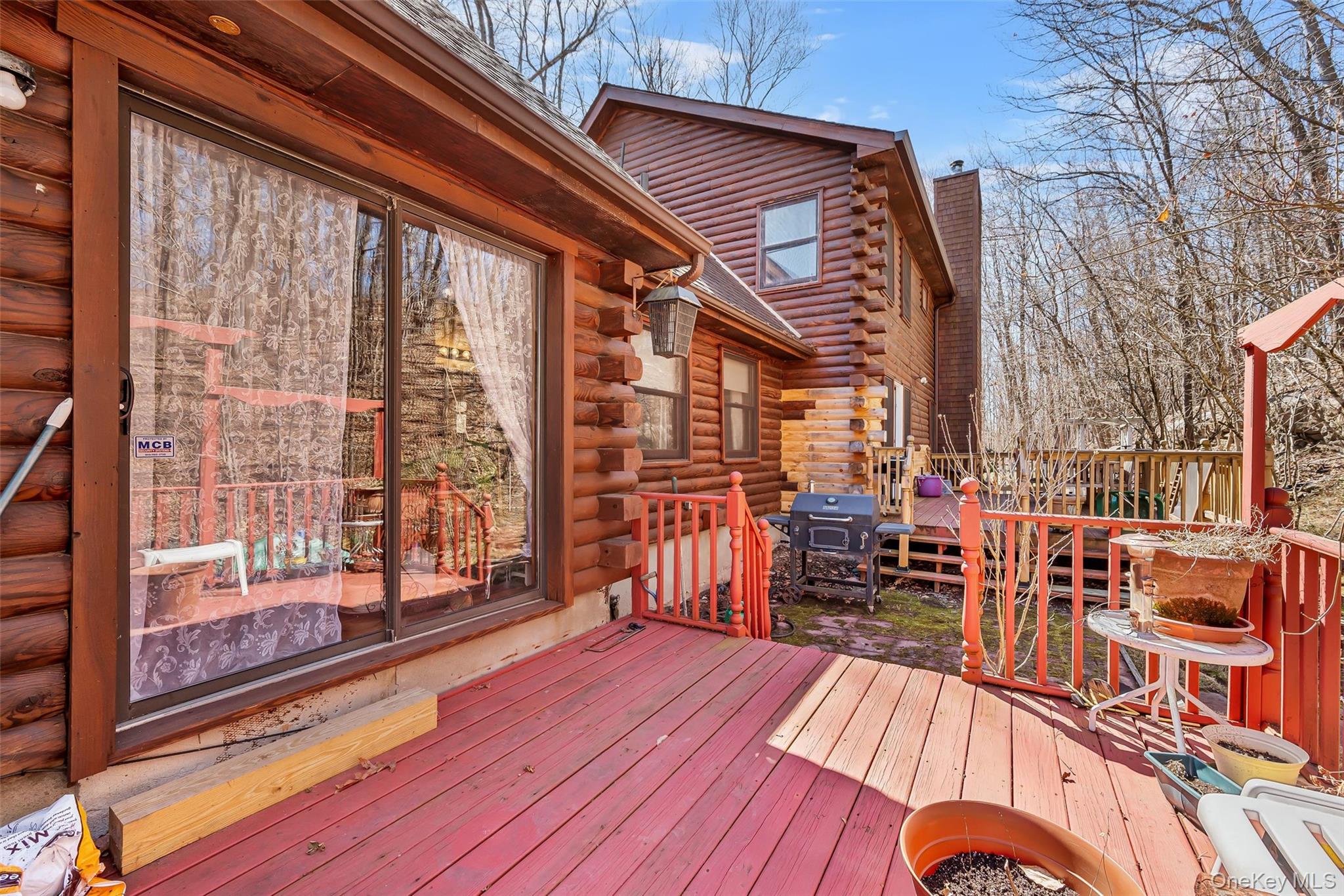 1085 County Rte 17 Montgomery, NY 12549 - Photo 43 of 50 a view of a balcony with wooden floor and outdoor seating