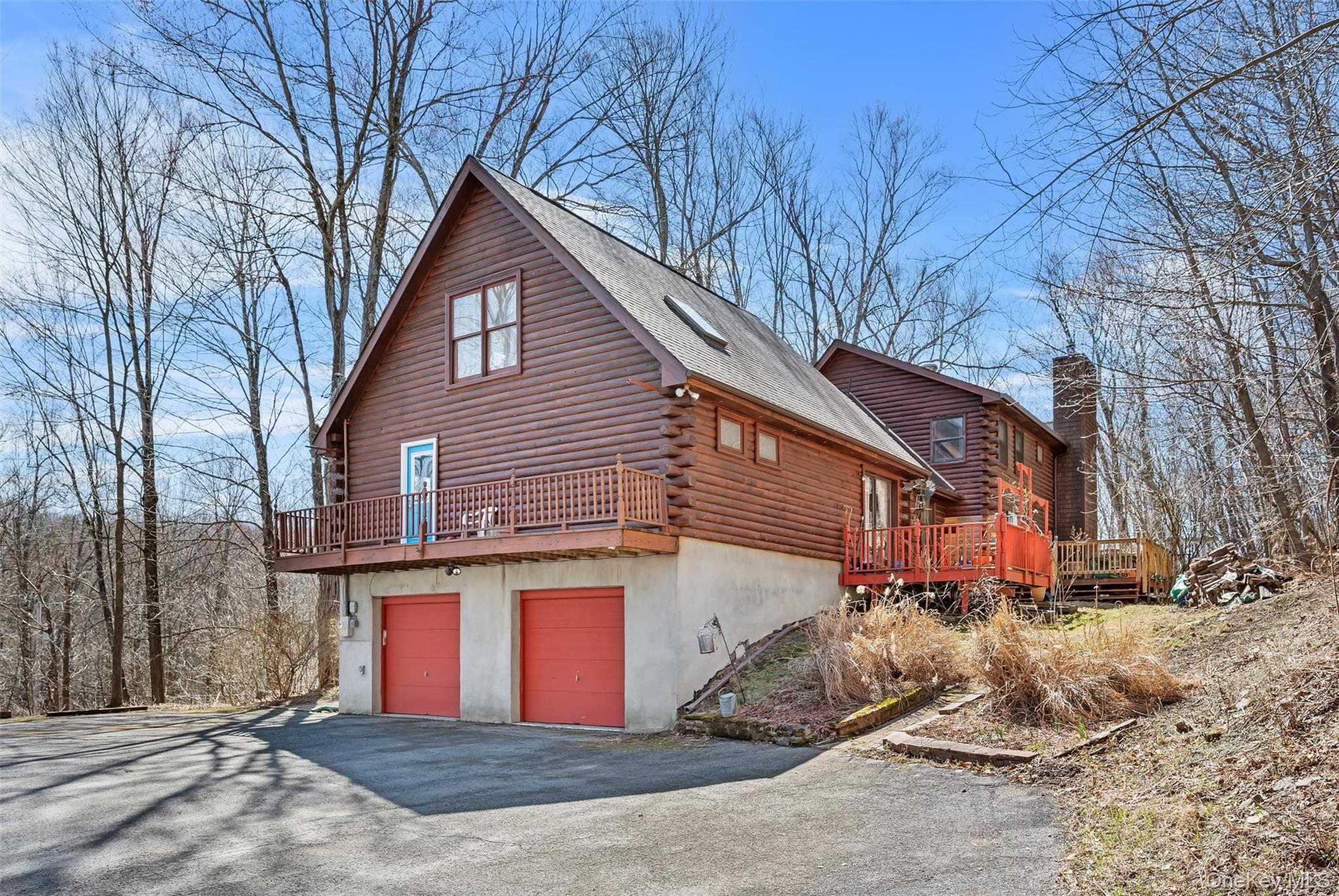 1085 County Rte 17 Montgomery, NY 12549 - Photo 49 of 50 a front view of a house with a yard and garage